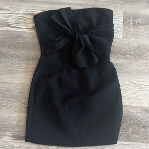 Likely black cocktail dress